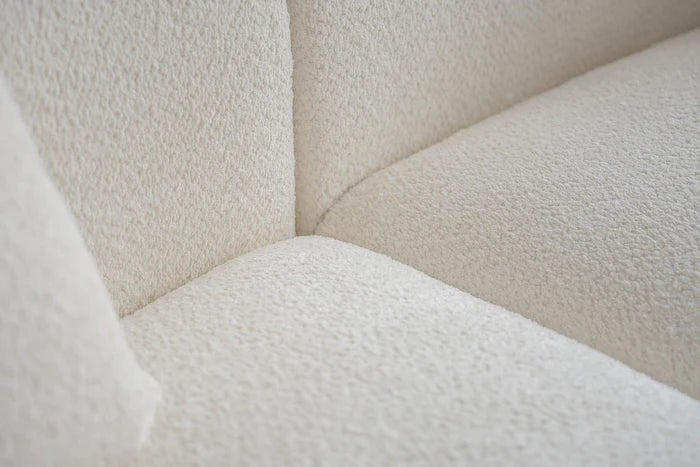 bella's curved boucle sofa