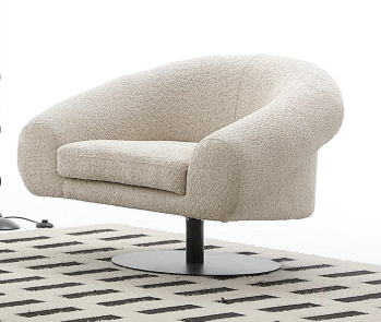 a spinning boucle armchair in beige