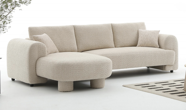 a beige sectional boucle sofa