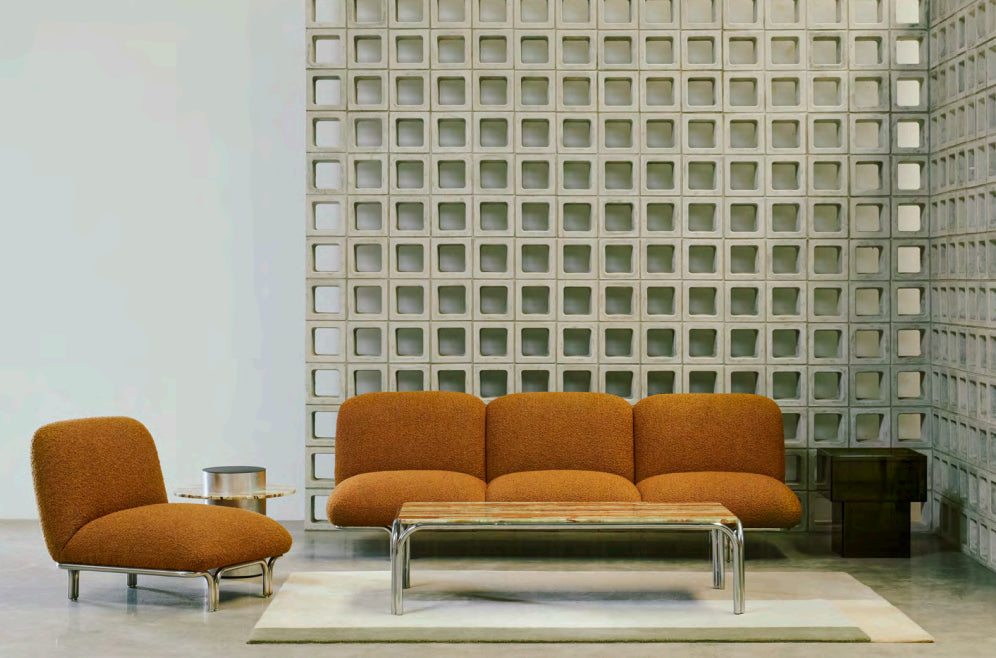 Furniture changes the room before anyone says a word.