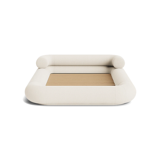 VELAR Sculptural Bed Frame in off white, front view with sculptural rounded upholstered frame and timber slats